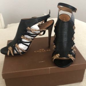 Coach black and brown strapped heels with wrap around ankle strap closure